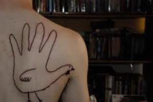 I gotta hand it to this guy, even if the tattoo is fowl.